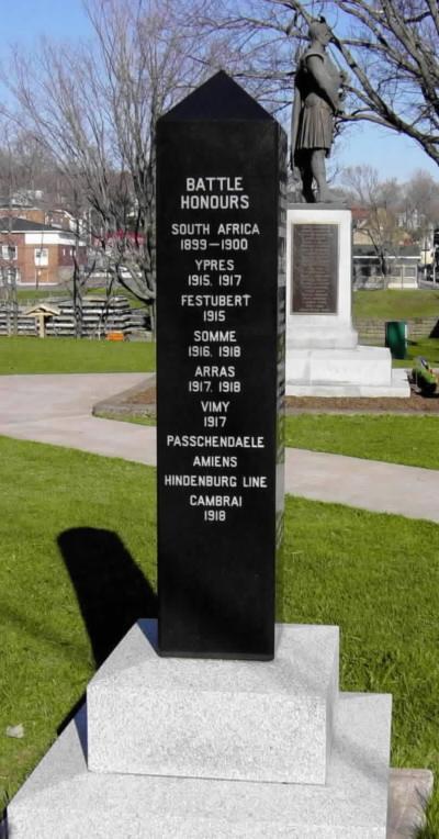 New Glasgow: Pictou Highlanders obelisk west face, with the New Glasgow war memorial in the background